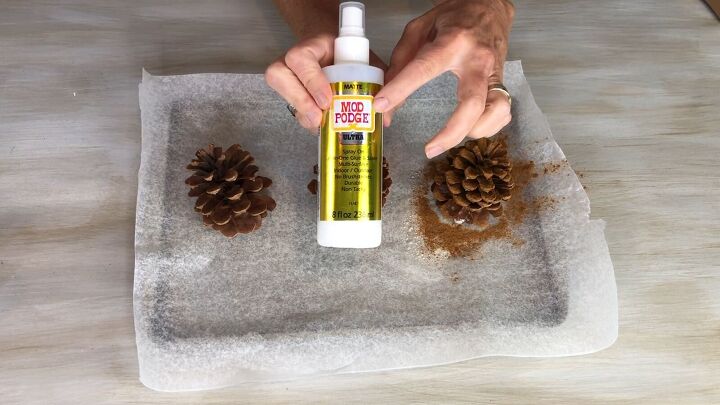 Transforming pine cones into festive decor