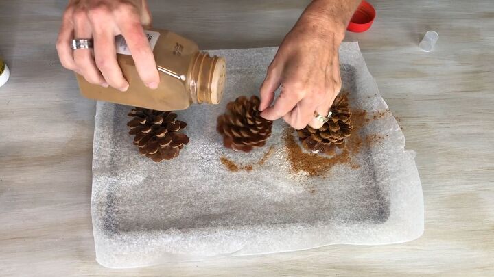 Sprinkle cinnamon over the sticky pine cones
