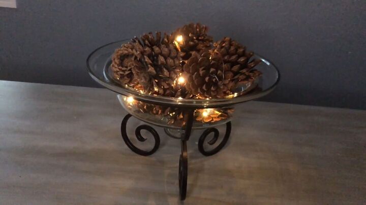 Pine cone display with fairy lights