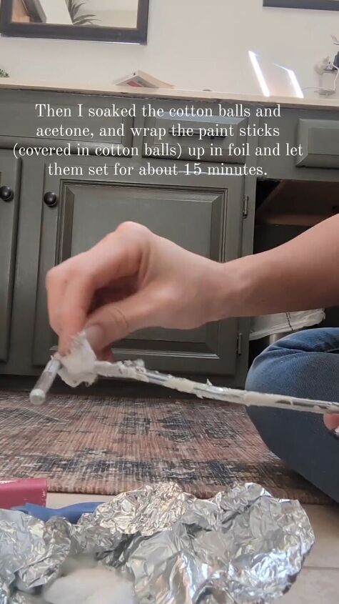 Covering the paint roller with acetone-soaked cotton balls