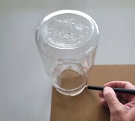 cmo hacer un espectacular farol de calabaza con papel, Dibujar un c rculo en papel alrededor de la parte superior de un tarro de alba il