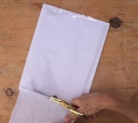 Taping the tissue paper to the bondpaper