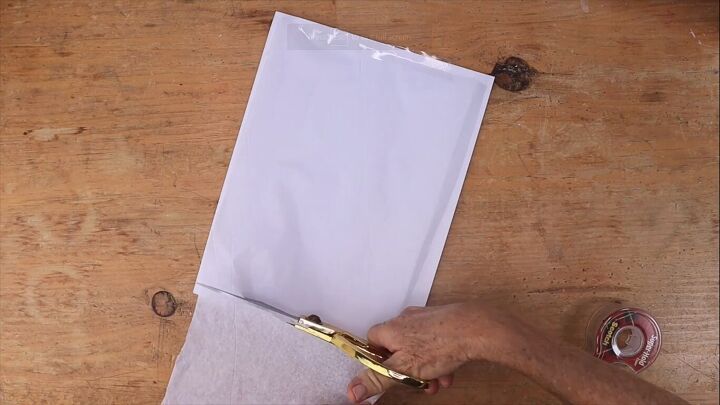 Taping the tissue paper to the bondpaper