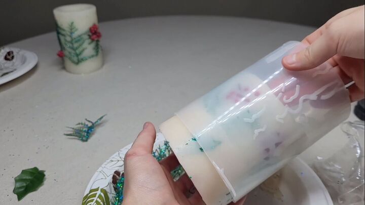 Sliding the candle out of the container