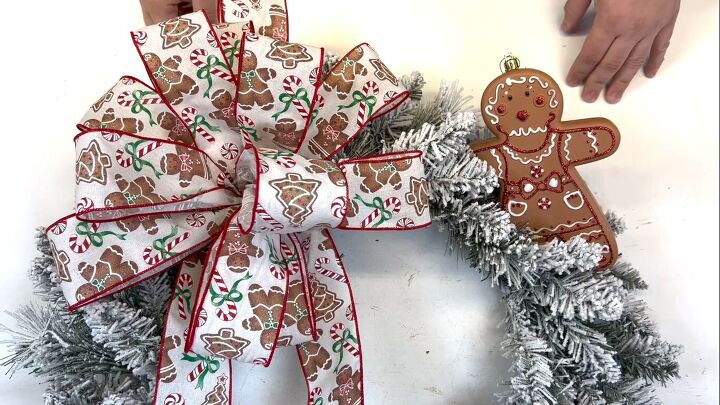 Placing the gingerbread men ornaments