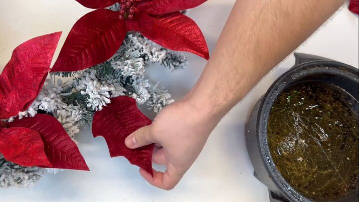 Gluing the poinsettia leave around the edge