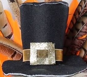 Add a gold buckle to the hat