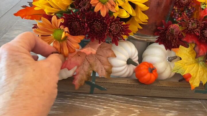Decorating with pumpkins and candles for Thanksgiving