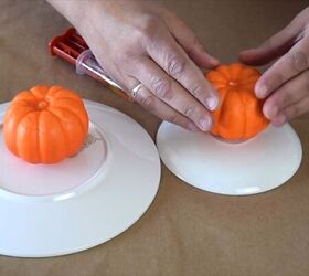 Attaching a pumpkin to the plate with epoxy