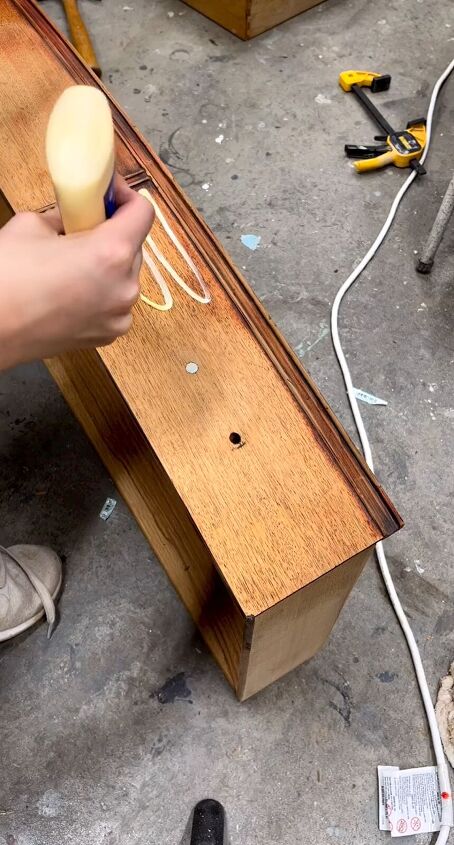 Attaching dowels to the drawer fronts