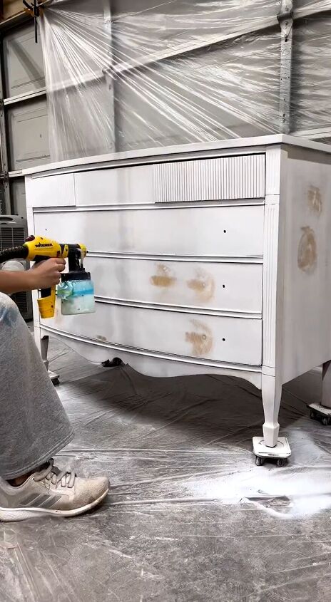 Priming the dresser before painting