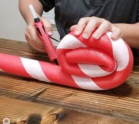 Hot gluing and coiling the pool noodle