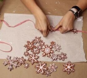Gluing the snowflakes onto the ribbon