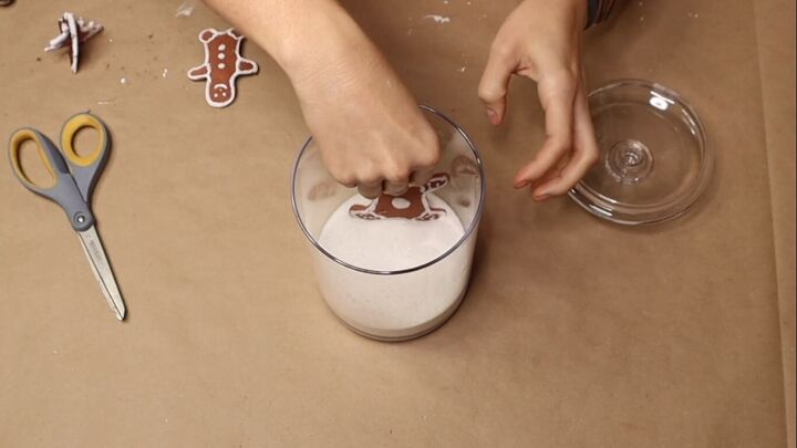 Inserting the gingerbread men into the sand