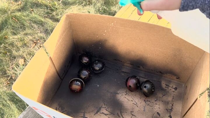Spraying the jingle bells with vinegar
