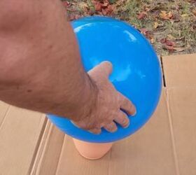 Setting the ball on a plant pot