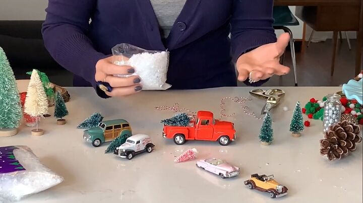 Adding snow and a Christmas tree to a toy truck