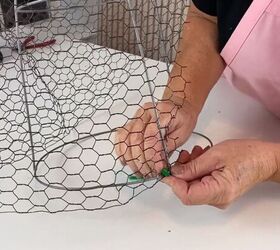 Securing the chicken wire with pipe cleaners