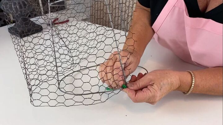 Securing the chicken wire with pipe cleaners