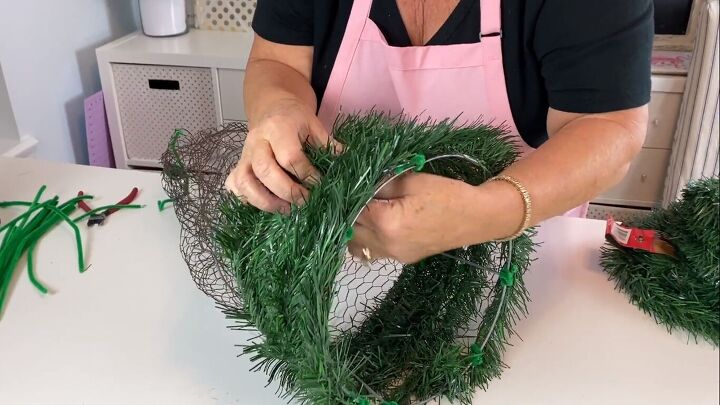 Wrapping garlands around the chicken wire