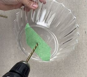 She drills a hole in the middle of a Dollar Tree bowl for this gorgeous idea