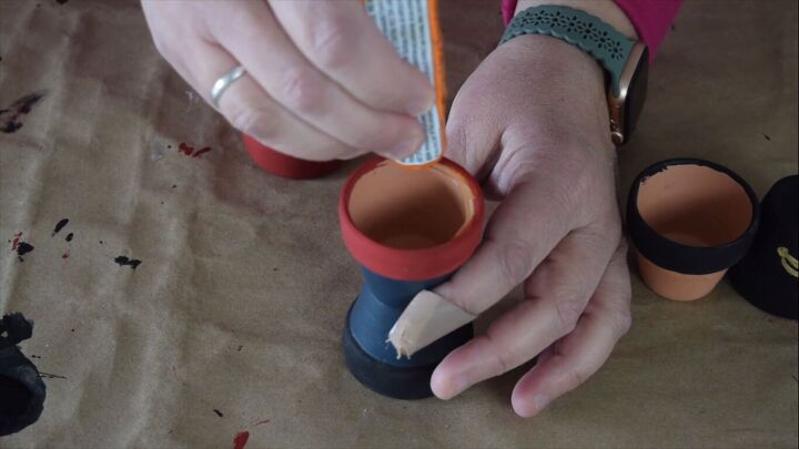 Gluing the pots together with contact cement