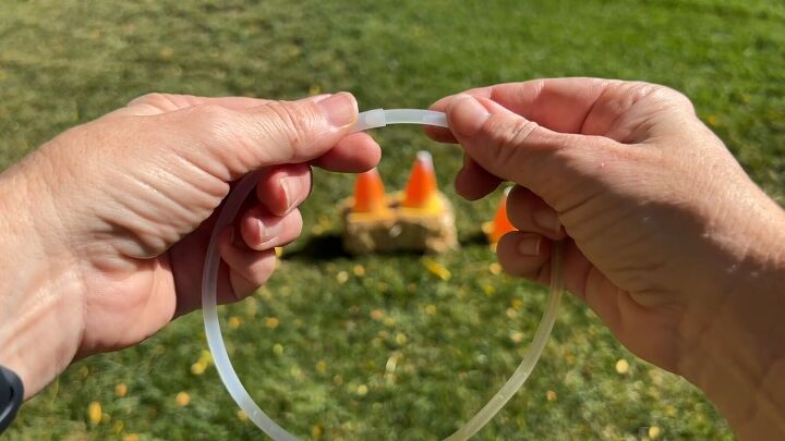 Crafting glow stick rings for candy corn ring toss