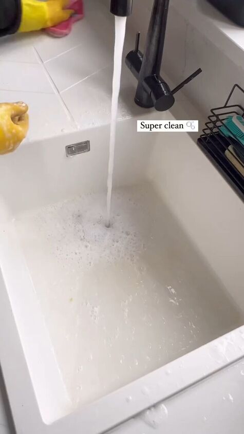 how to clean a white sink, Rinsing the sink and counter with warm water