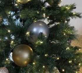 Metallic balloons arranged on a Christmas tree
