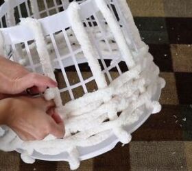 Weaving yarn through laundry basket slats