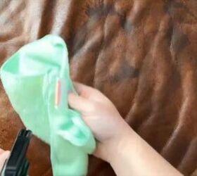Cleaning a sofa with homemade cleaner