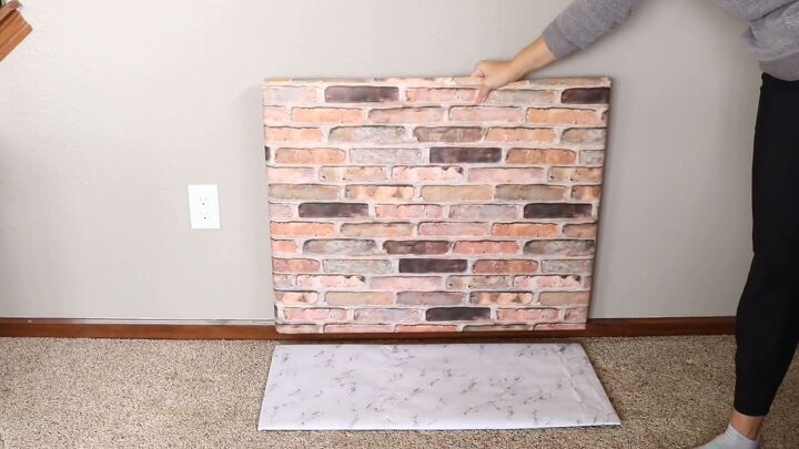 Assemble the DIY fake fireplace from cardboard