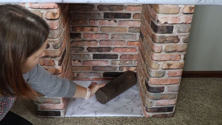 Cardboard fireplace and wood grain logs