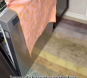 Hanging a dish towel over the dishwasher drawer