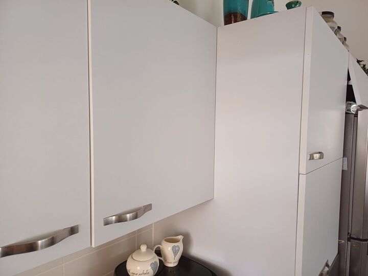 Clean cabinets with dawn tide and a squeegee