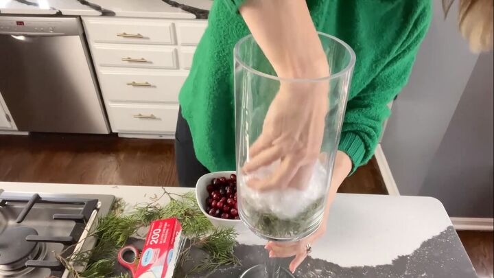 Adding a layer of plastic wrap on top of the greenery