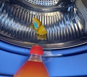 She pours vinegar into the rim of her washing machine for this genius hack