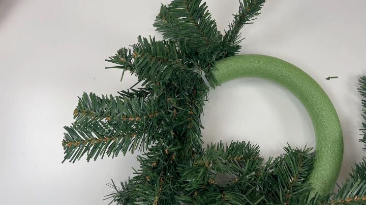 Secure garland to the wreath with zip ties