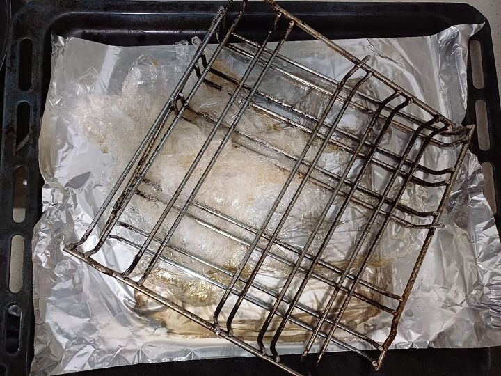 Oven racks after sitting in cling film with cleaner