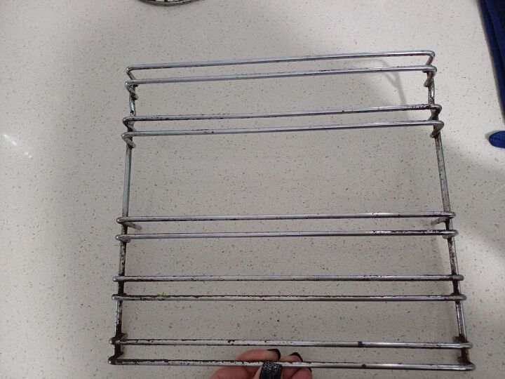 Plastic wrap hack for cleaning oven racks
