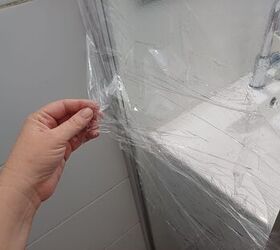 clean shower door, Remove the plastic wrap from the shower door