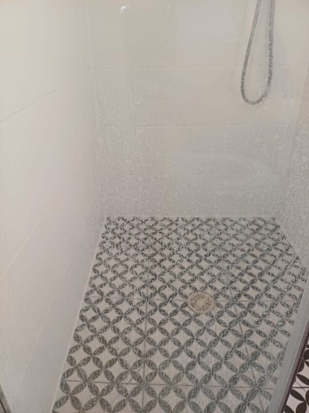 Hard water stains on shower door