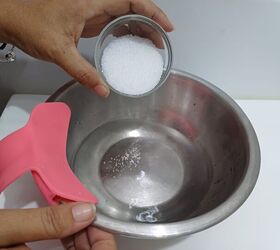 DIY citric acid cleaner for hard water stains on shower doors