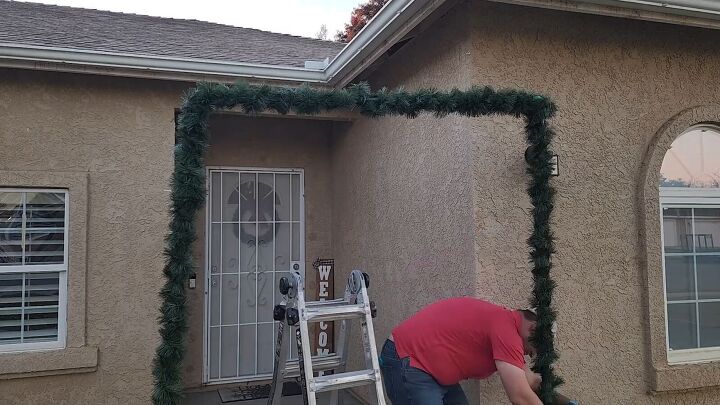 diy christmas arch, Wrap the garland around the whole archway