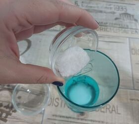 Pour salt and baking soda into a glass of water