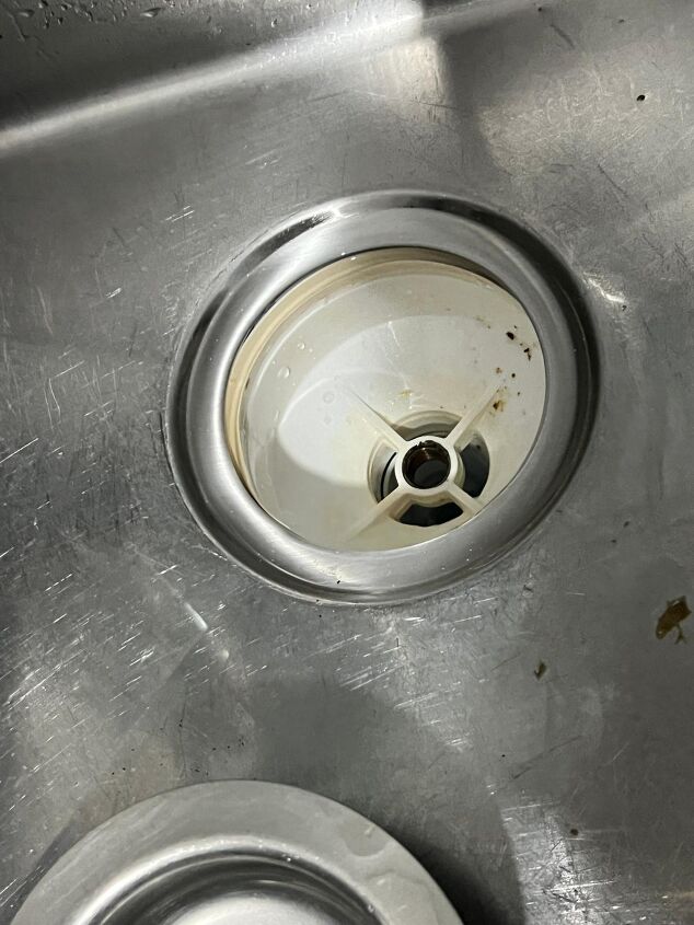 Clean the inside of kitchen sink strainer