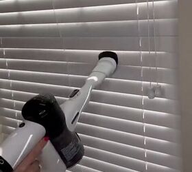 Vacuuming the blinds