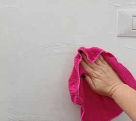 Wipe the wall with a damp cloth