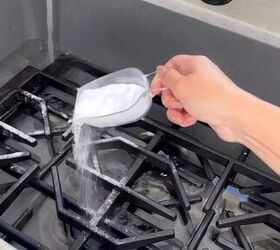 Pouring baking soda on the stove