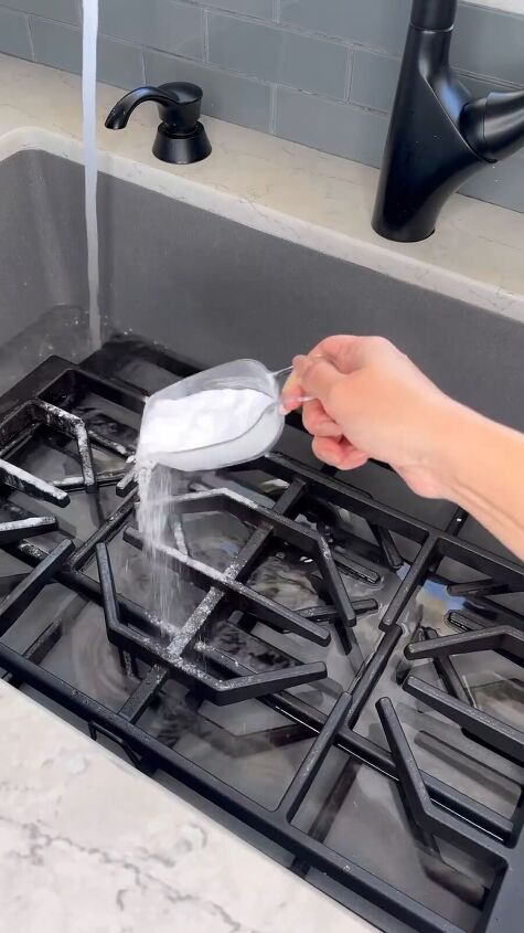 how to deep clean your gas stove, Pouring baking soda on the stove